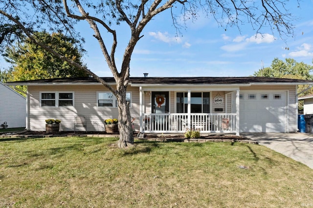 single story home with a garage, a front yard, and covered porch