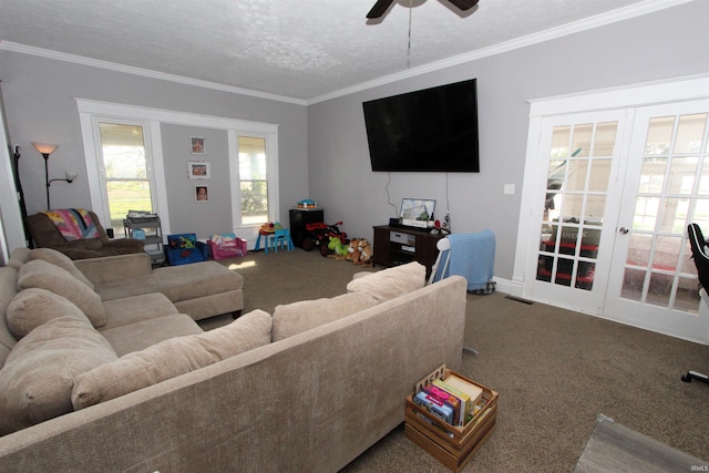 carpeted living room featuring french doors, a textured ceiling, ornamental molding, and ceiling fan