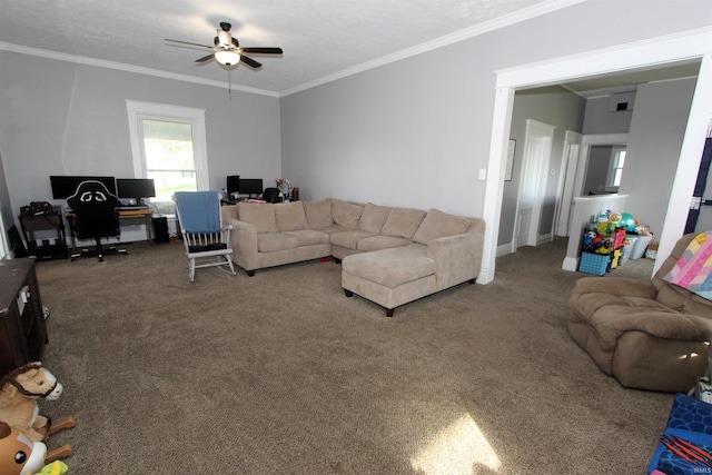 carpeted living room featuring ornamental molding and ceiling fan