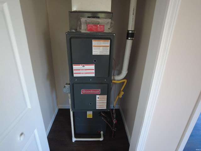 utility room with heating unit