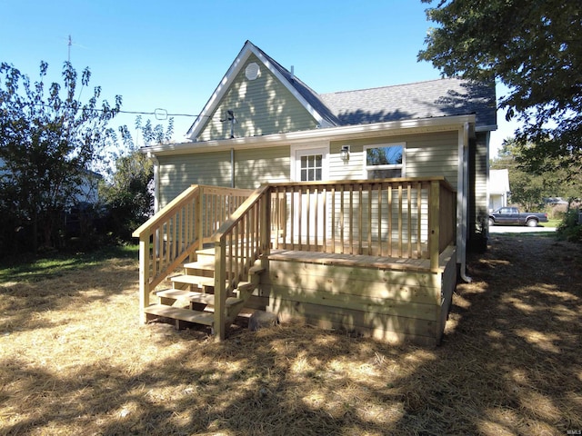 rear view of property with a deck