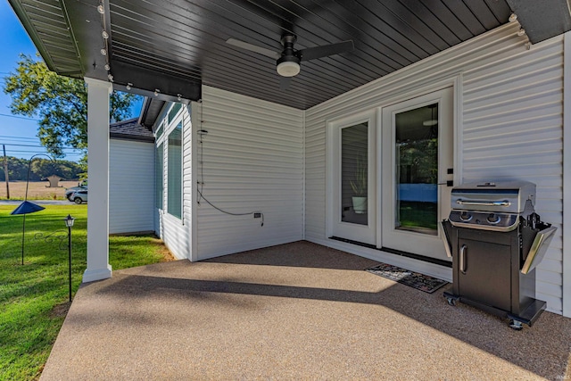 view of patio / terrace with ceiling fan and area for grilling