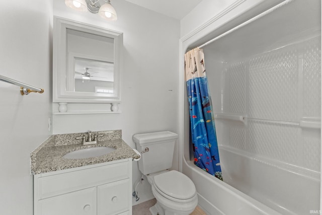 full bathroom featuring ceiling fan, shower / bath combo with shower curtain, vanity, and toilet