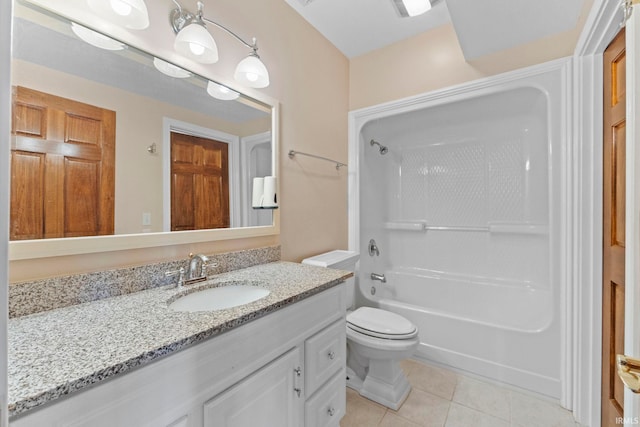 full bathroom featuring tile patterned floors, vanity, toilet, and  shower combination