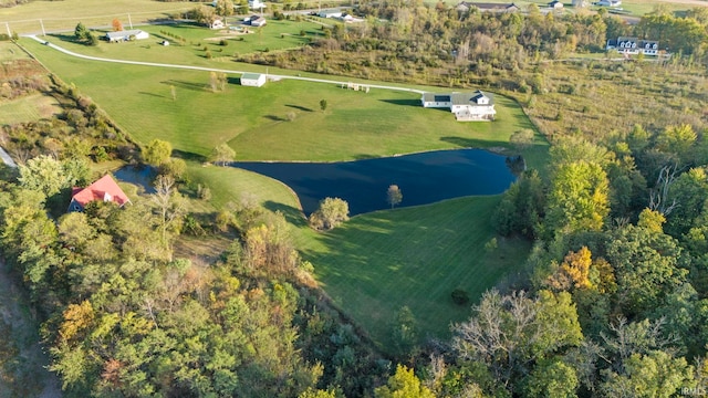 birds eye view of property with a rural view and a water view