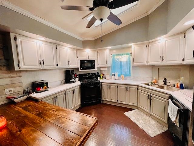 kitchen featuring ceiling fan, black appliances, and white cabinetry