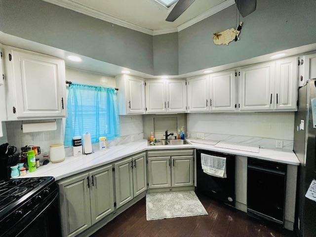 kitchen featuring ornamental molding, white cabinetry, and dark hardwood / wood-style floors