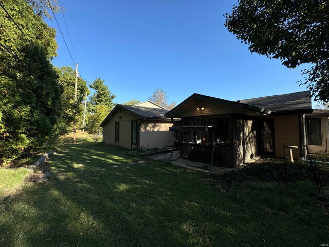 exterior space featuring a lawn