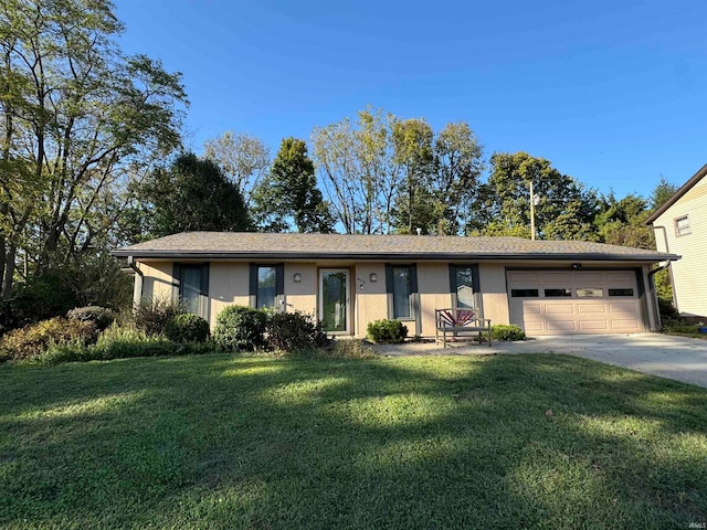 single story home with a front yard and a garage