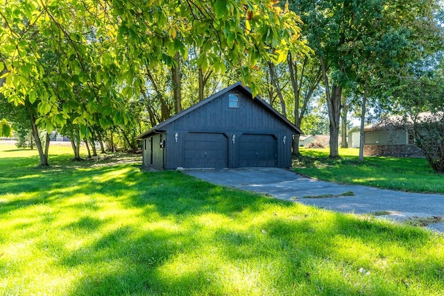 garage with a yard