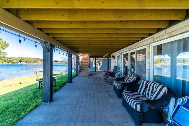 view of patio / terrace with a water view