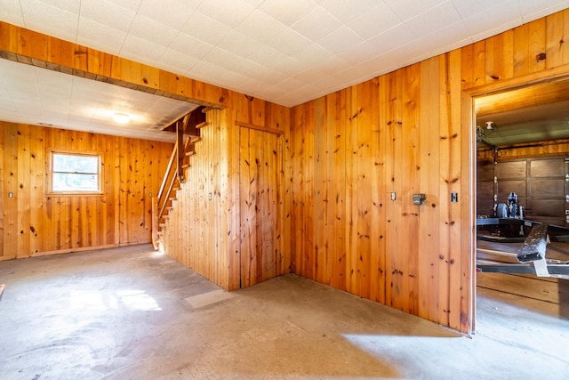 empty room with wooden walls