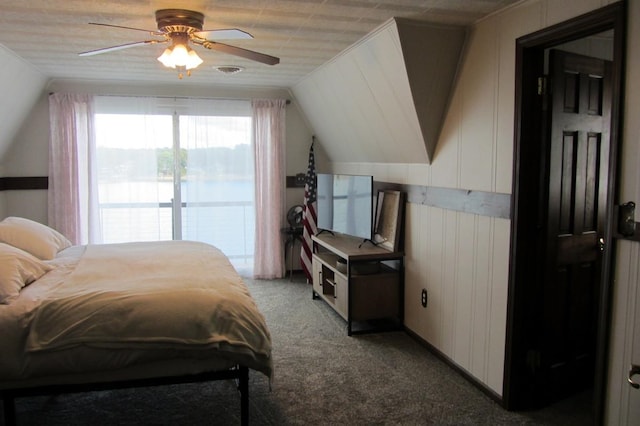 bedroom featuring ceiling fan, carpet floors, vaulted ceiling, and access to outside