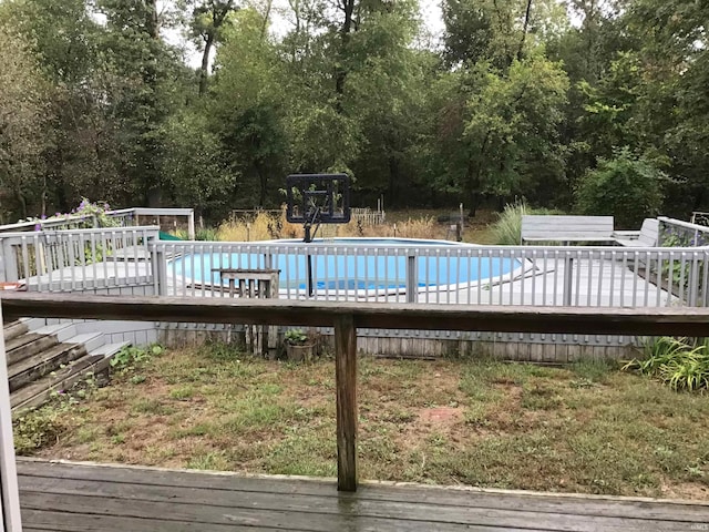 view of pool featuring a deck