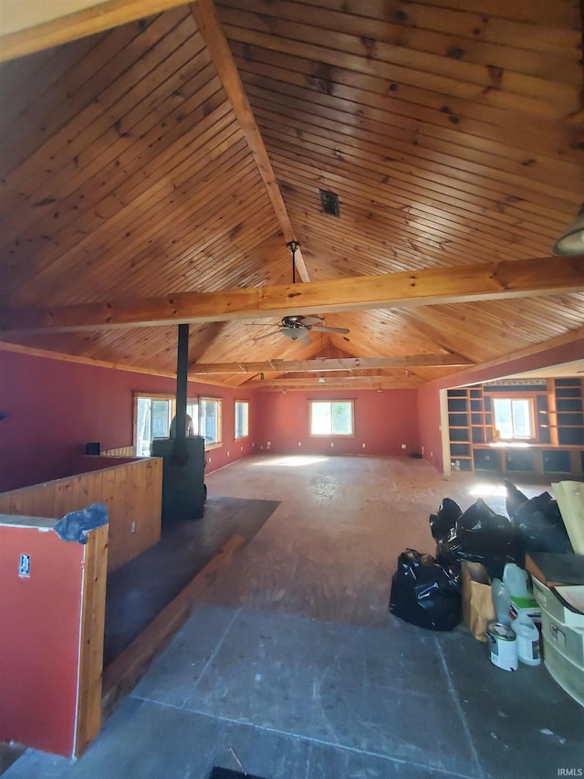 bonus room with wooden ceiling and lofted ceiling with beams