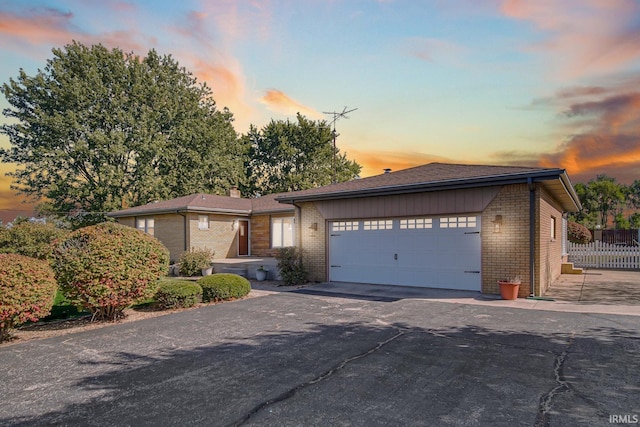 view of front of home with a garage