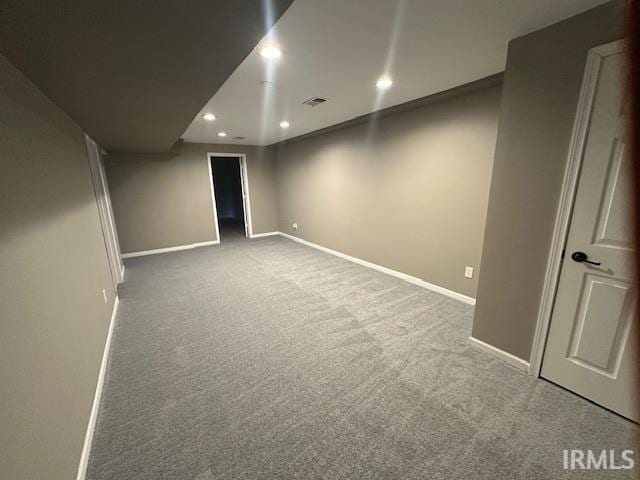 basement featuring carpet flooring