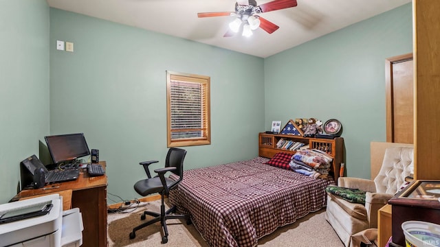 bedroom featuring ceiling fan and carpet floors