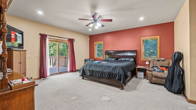 carpeted bedroom featuring ceiling fan and access to exterior