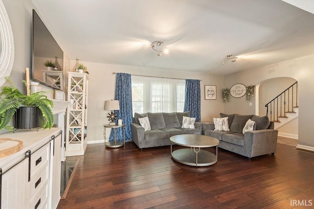 living room with dark wood-type flooring