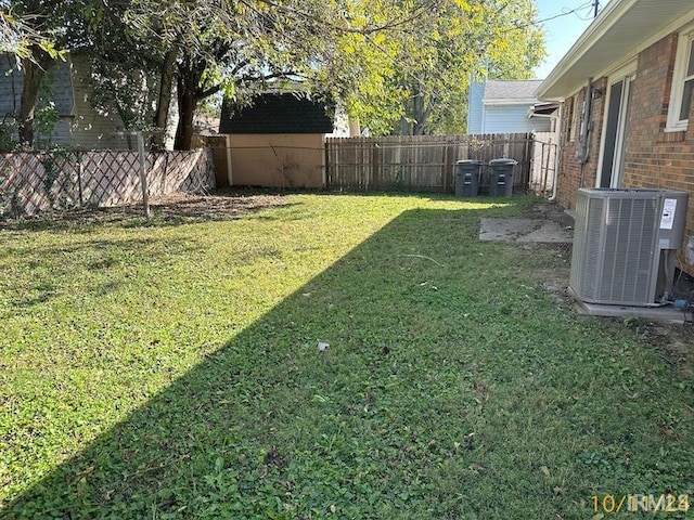 view of yard with central AC