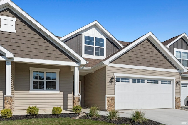 craftsman house with a garage