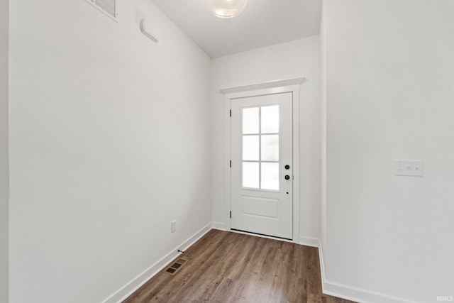 doorway to outside with hardwood / wood-style floors