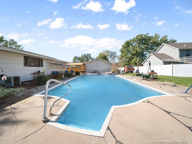 view of pool featuring a patio area