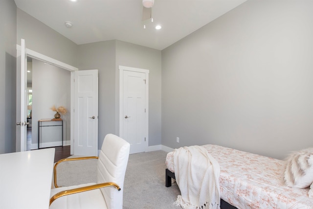 carpeted bedroom with ceiling fan