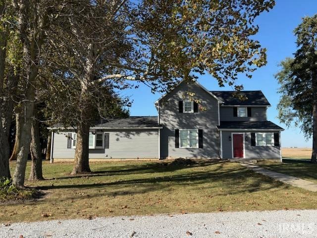 view of front of property with a front lawn