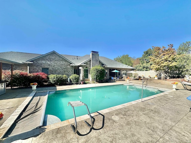 view of pool with a patio