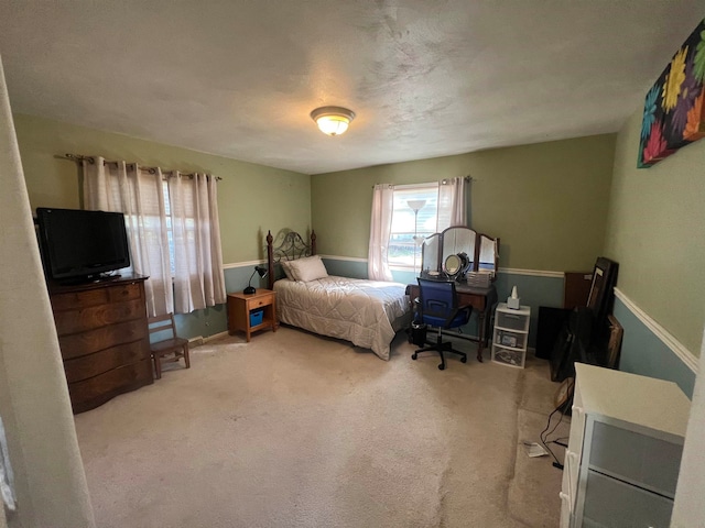 bedroom featuring carpet