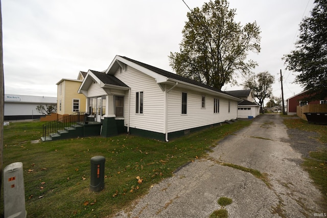 view of property exterior featuring a yard