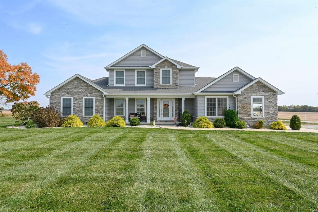 view of front of home with a front lawn