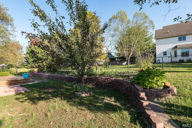 view of yard with a wooden deck