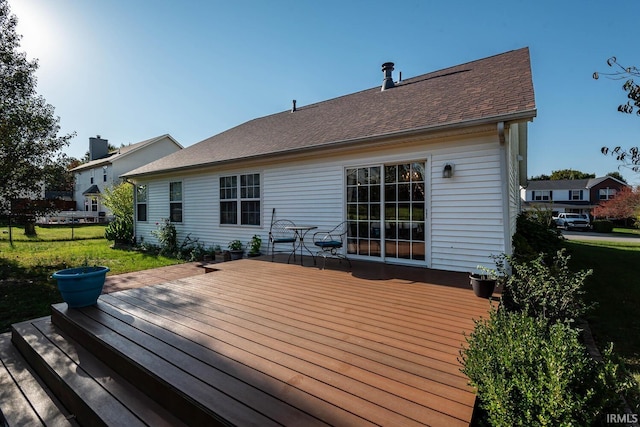 deck featuring a lawn