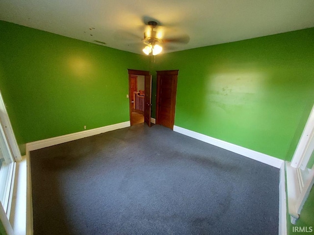 spare room featuring ceiling fan