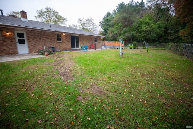 view of yard with a patio area