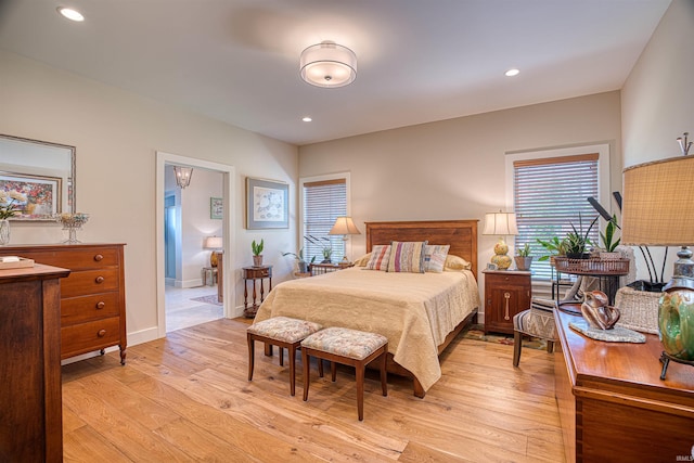 bedroom with light hardwood / wood-style flooring