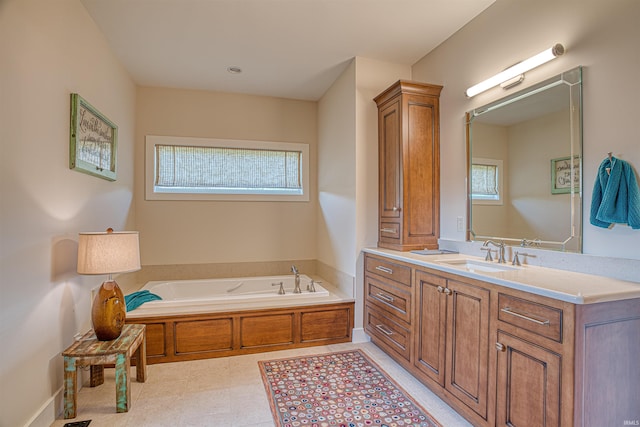 bathroom featuring a bath and vanity