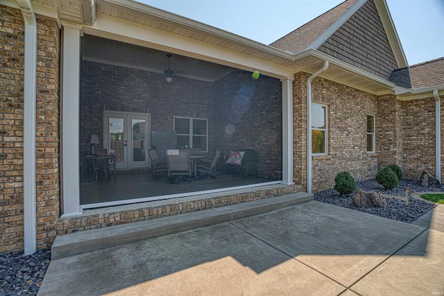 entrance to property with a patio area