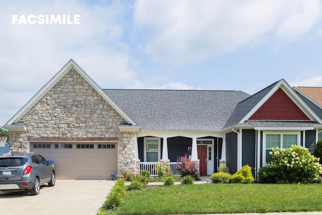 craftsman inspired home with a garage, a front yard, and covered porch