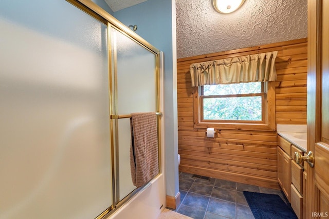 1291 N Sewell Rd, Bloomington, IN 47408 - full bath featuring wooden walls, enclosed tub / shower combo, and a textured ceiling