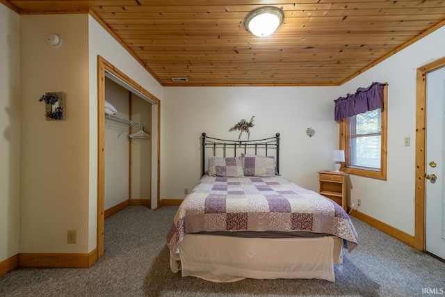 1291 N Sewell Rd, Bloomington, IN 47408 - carpeted bedroom featuring wooden ceiling, a closet, and baseboards