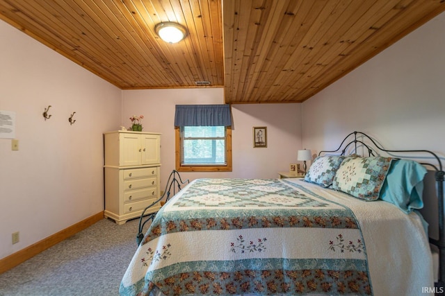 1291 N Sewell Rd, Bloomington, IN 47408 - carpeted bedroom with wood ceiling and baseboards
