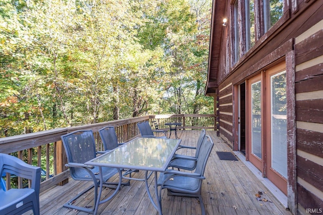 1291 N Sewell Rd, Bloomington, IN 47408 - wooden terrace featuring outdoor dining space