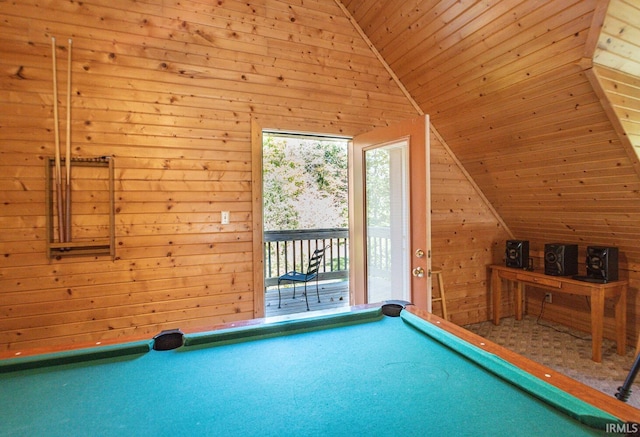 rec room with vaulted ceiling, wood ceiling, and wood walls