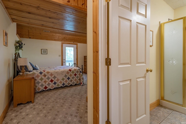 bedroom featuring lofted ceiling, light colored carpet, and wooden ceiling