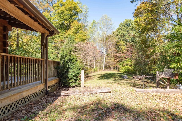 view of yard featuring a deck