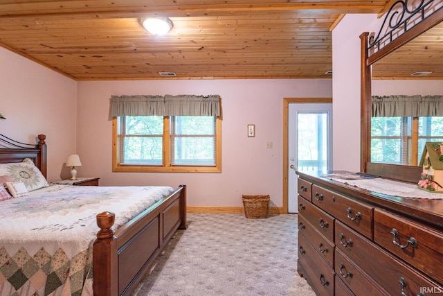 carpeted bedroom featuring wood ceiling